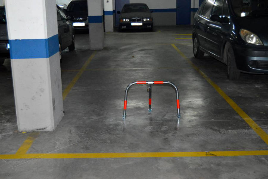 Barrera guarda plaza para parking y garajes privados